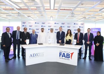 سوق أبوظبي للأوراق المالية وبنك أبوظبي الأول يوقعان اتفاقية لتوزيع الأرباح النقدية